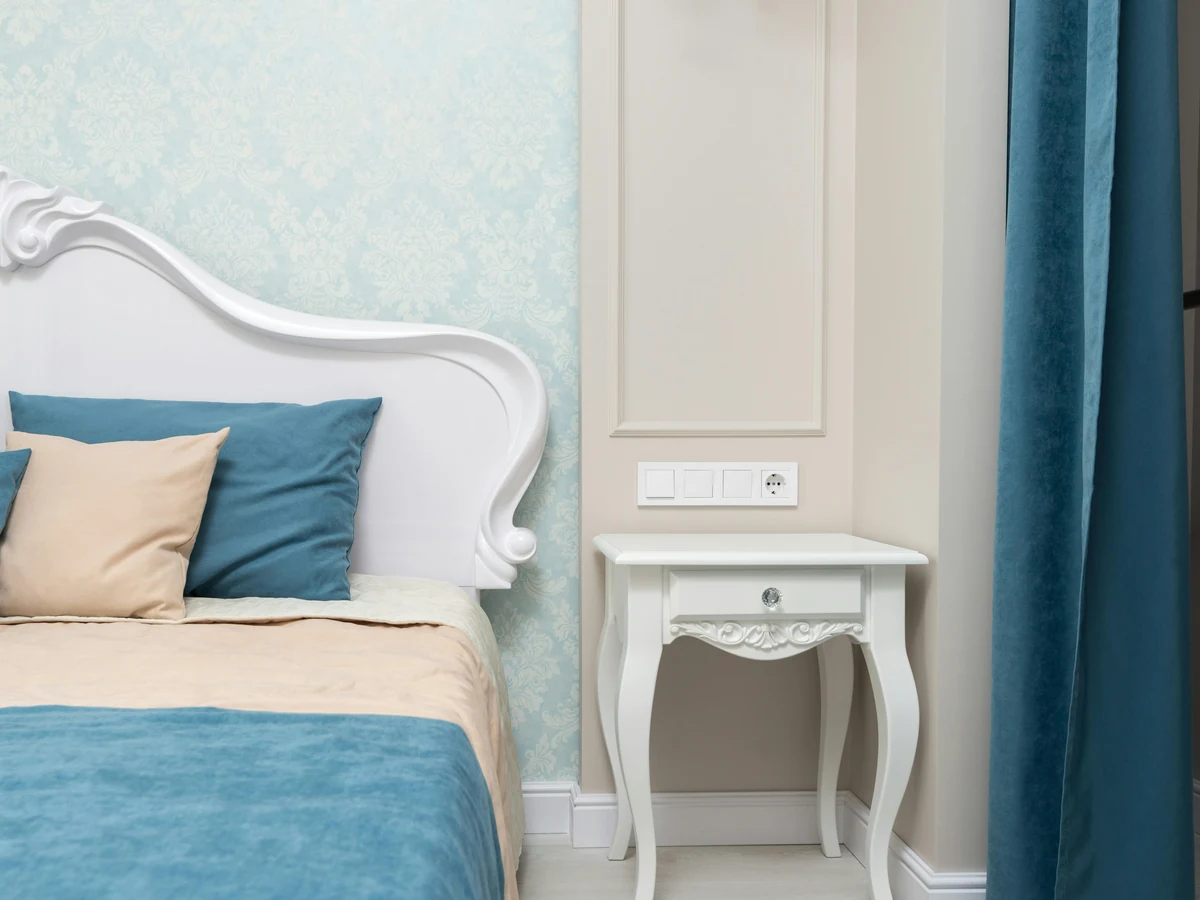 Bedroom wallpapering with blue floral design in Ipswich