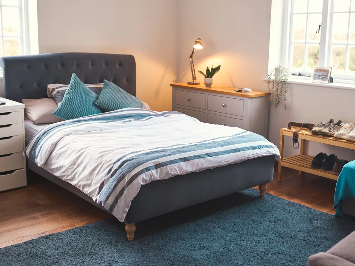 Teenage bedroom painted in teal colour by professional painters