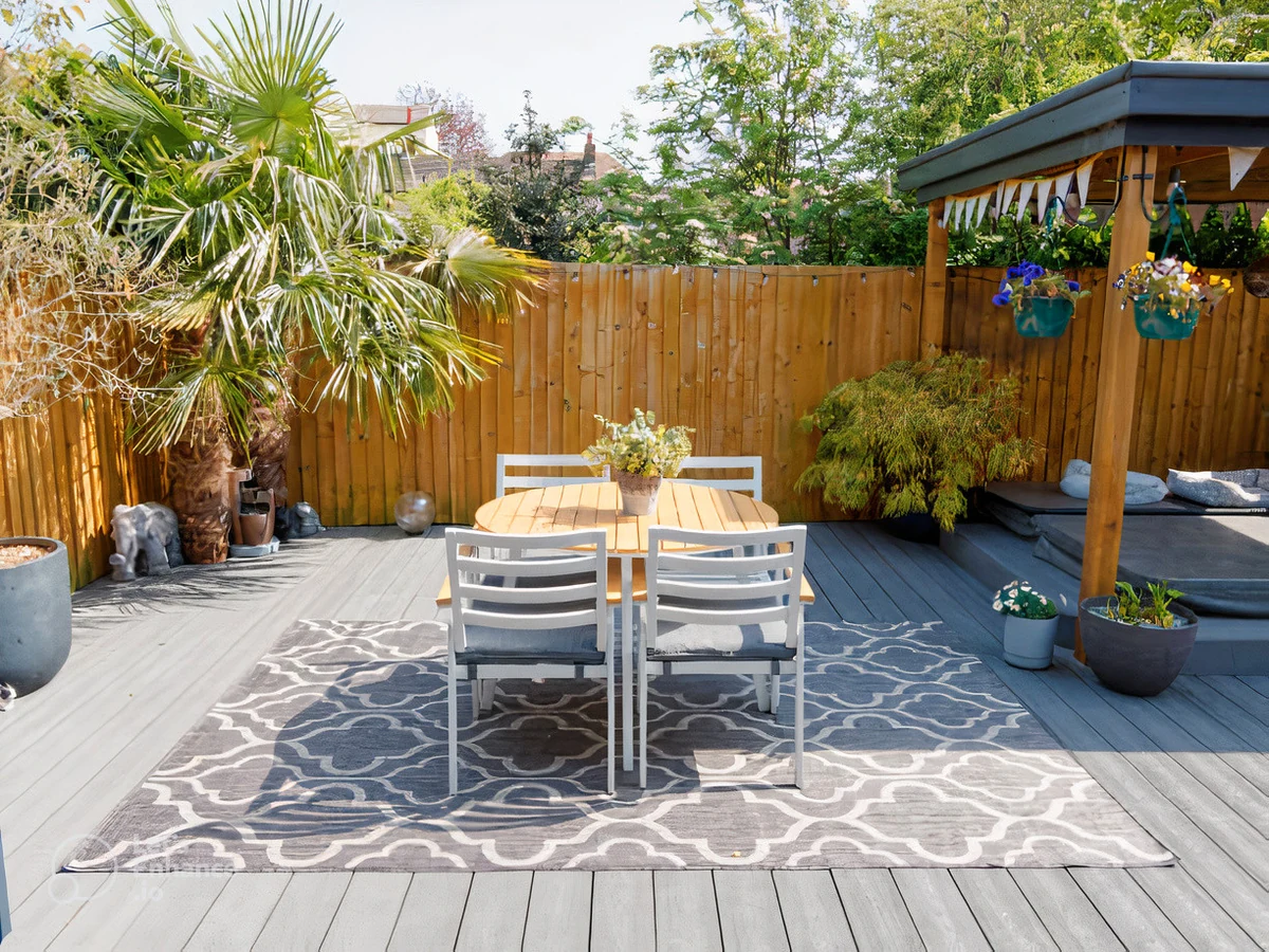 Garden deck with dining area in Ipswich, freshly painted and sealed