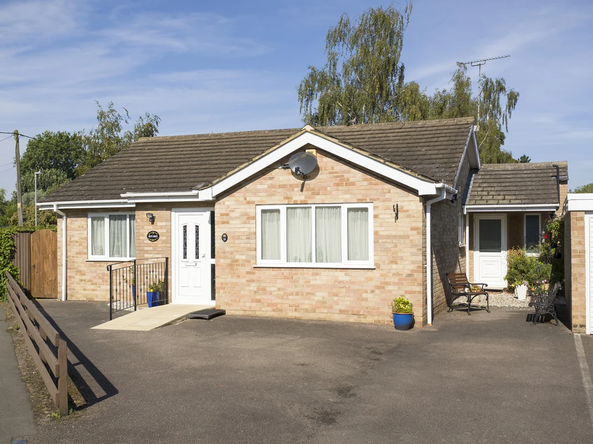 Brick bungalow exterior painting in Ipswich showing full property treatment