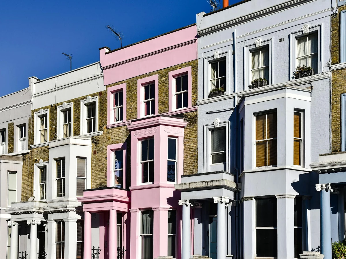 Front door painting on colourful London terraced property in Ipswich