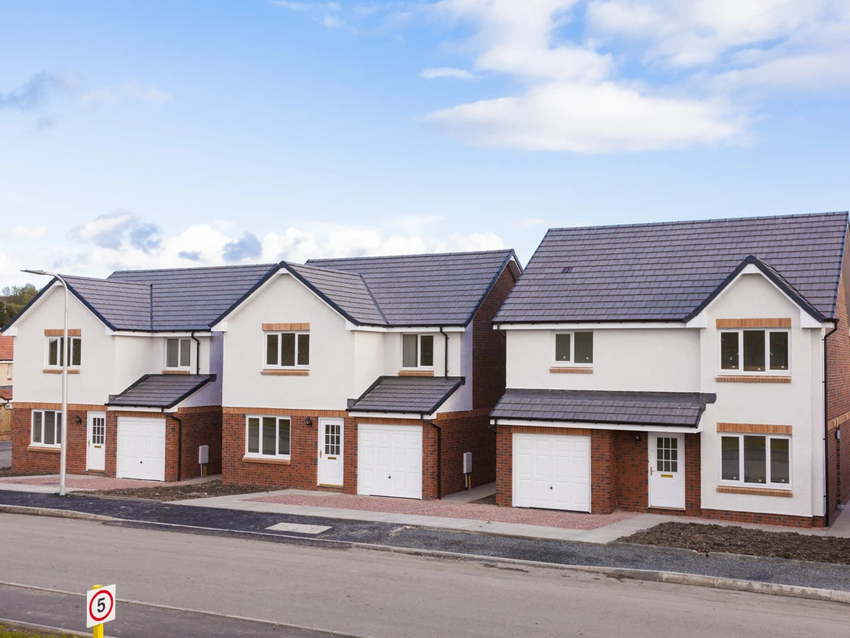 Row of new detached houses exterior painting project in Ipswich by Ipswich Painters