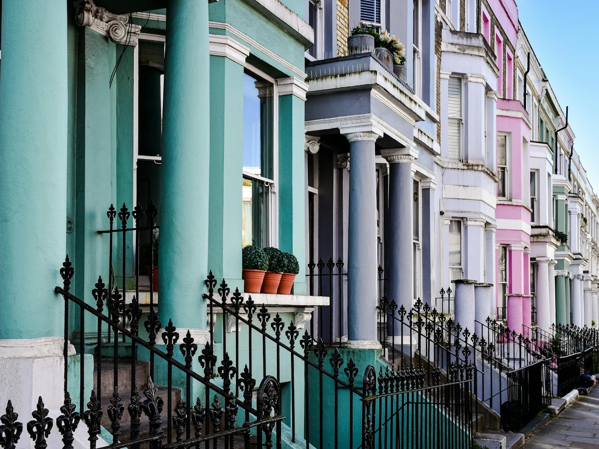 Coloured exterior painting of period house showing teal and pink palette in Ipswich