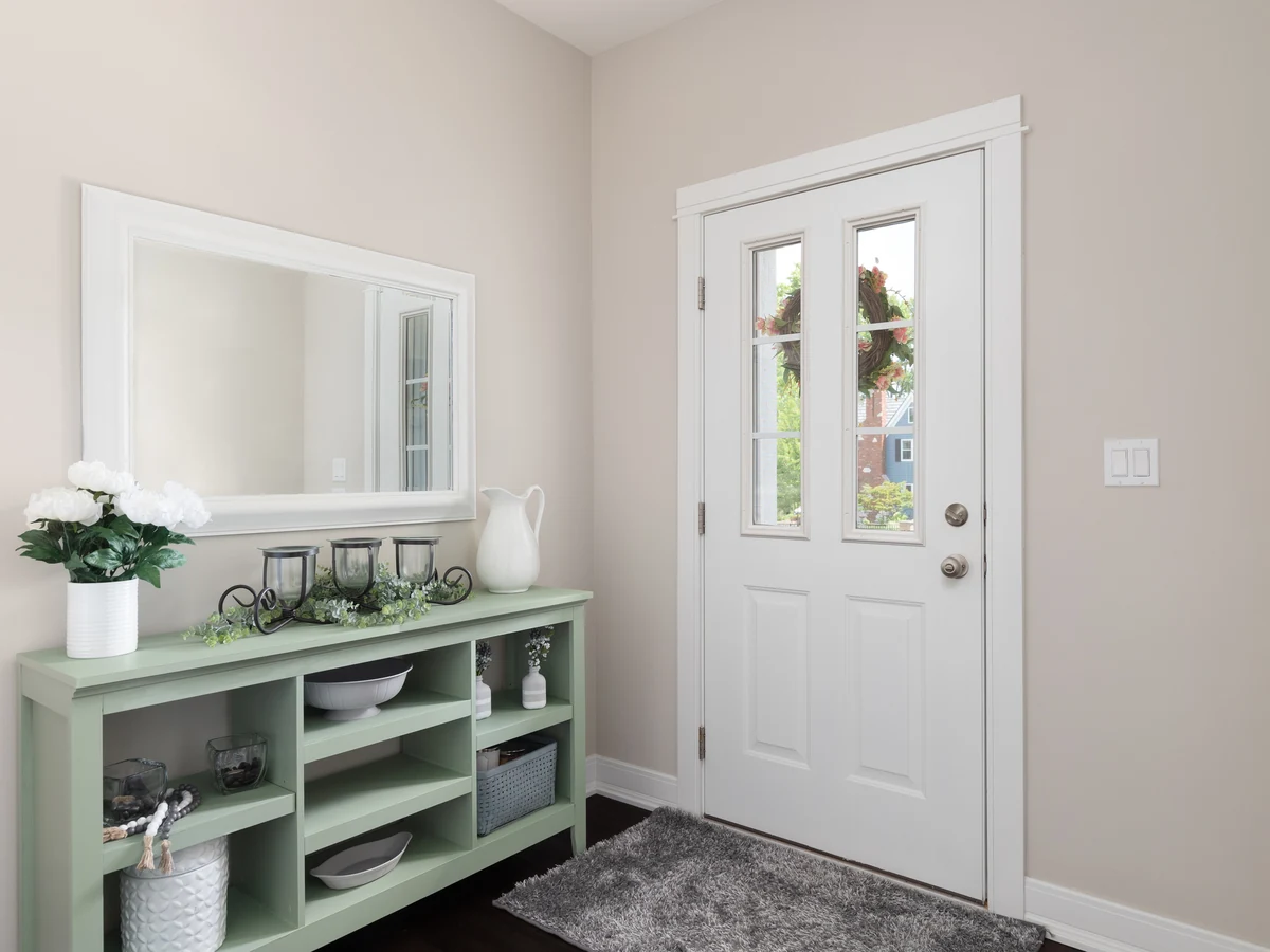 Entryway with beige walls painting in Ipswich, warm neutral decor