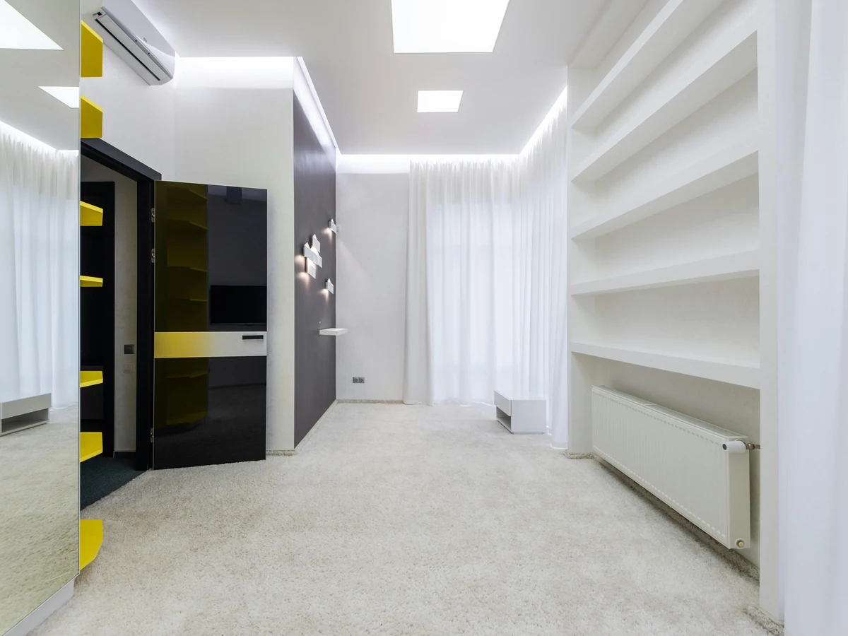 Empty white interior room ready for professional painting in Ipswich