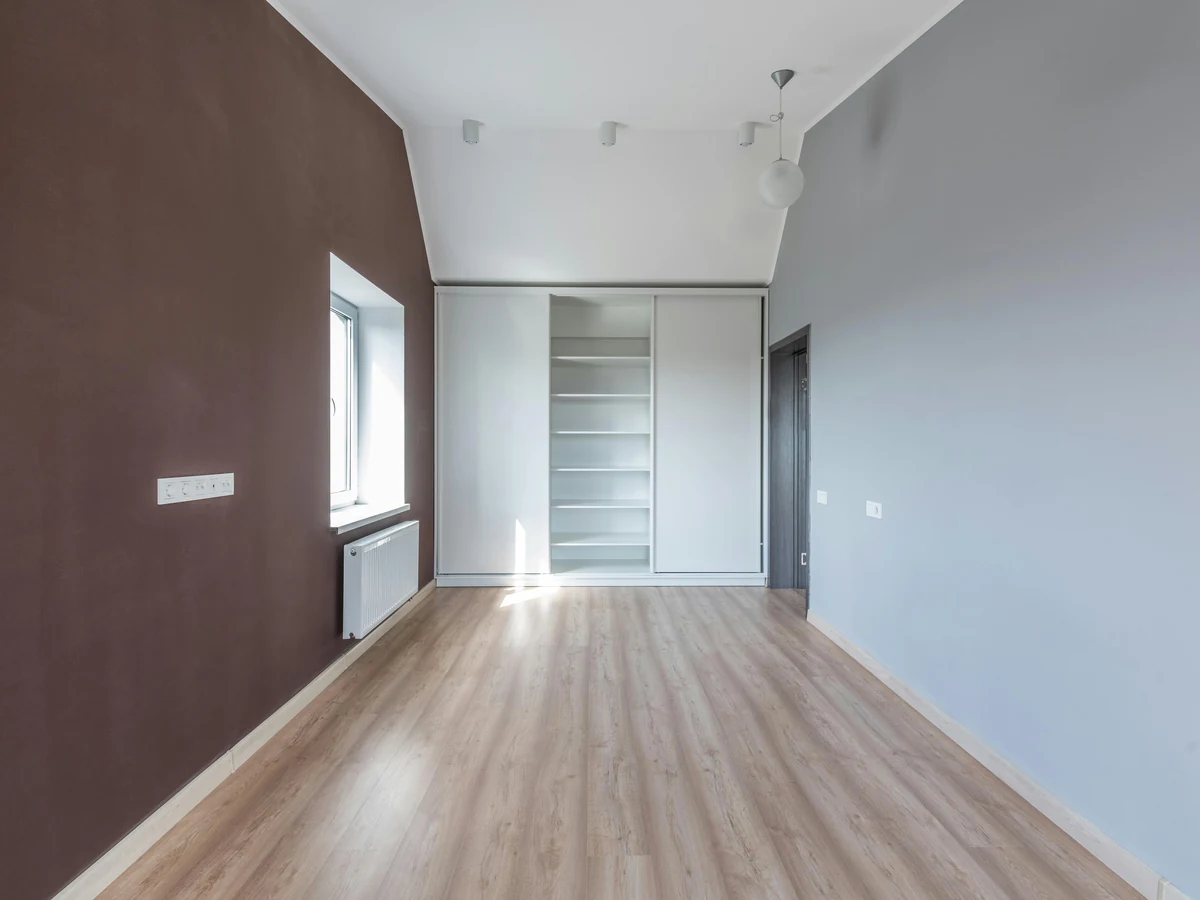 Interior painting of warm brown and grey room in Ipswich