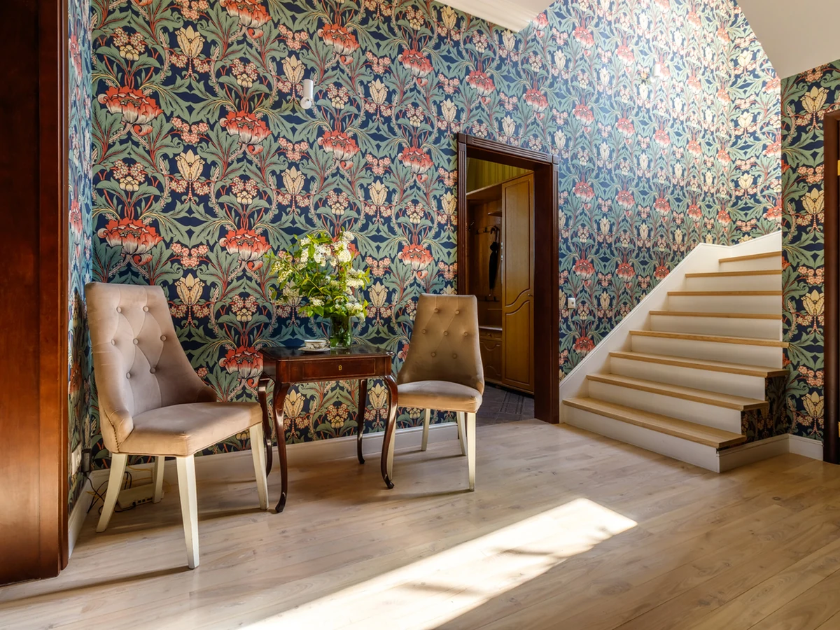 Ornate floral wallpaper installation in Ipswich by Ipswich Painters, professional wallpapering